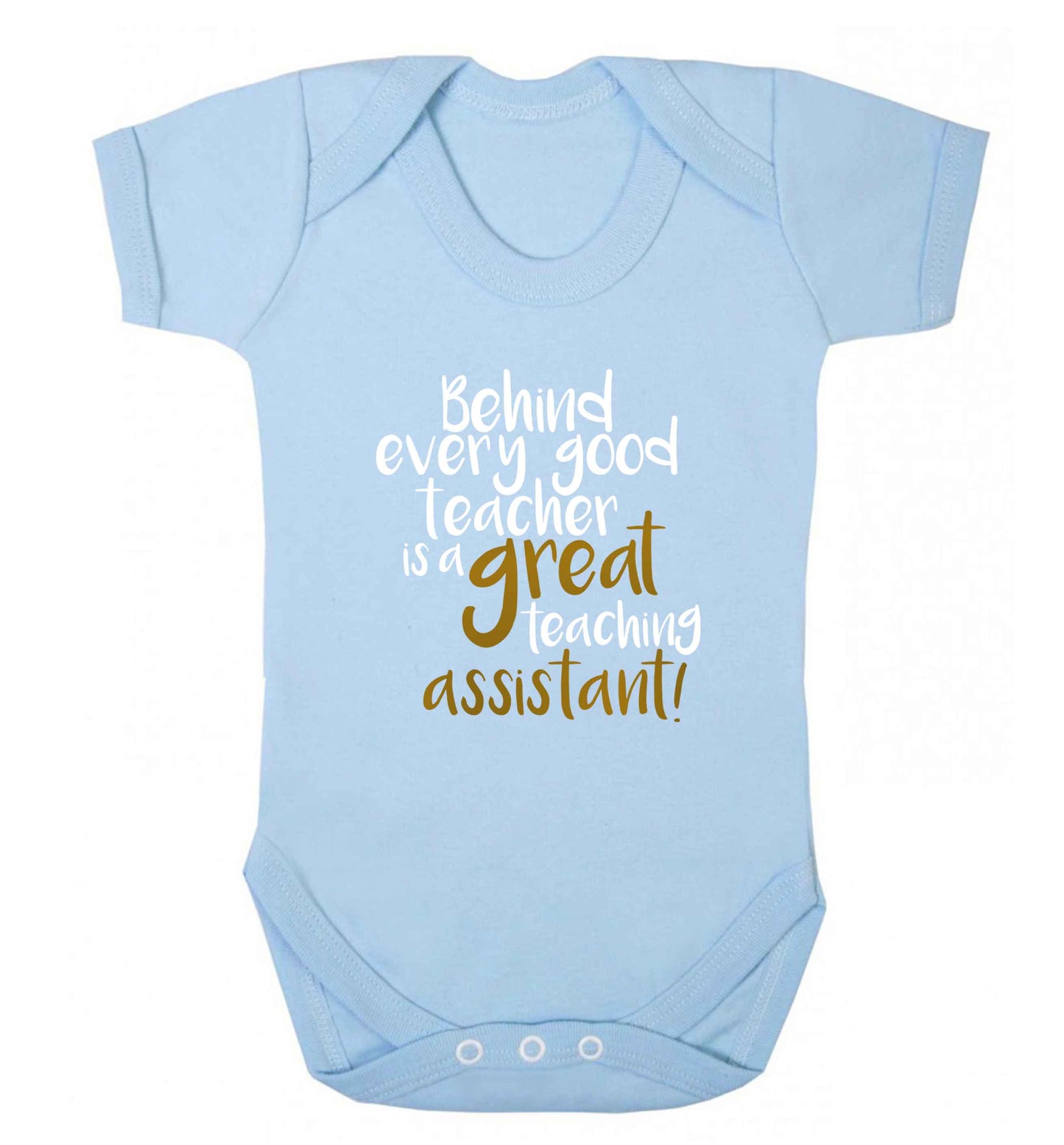 Behind every good teacher is a great teaching assistant baby vest pale blue 18-24 months