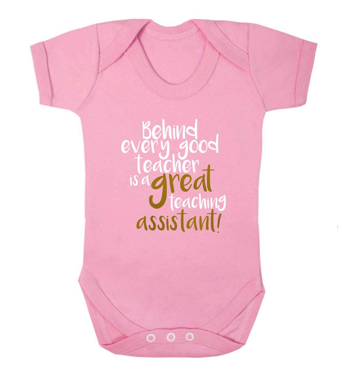 Behind every good teacher is a great teaching assistant baby vest pale pink 18-24 months