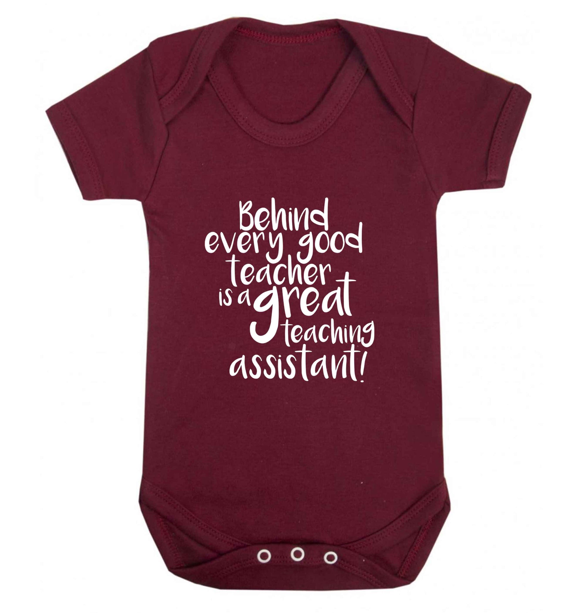 Behind every good teacher is a great teaching assistant baby vest maroon 18-24 months