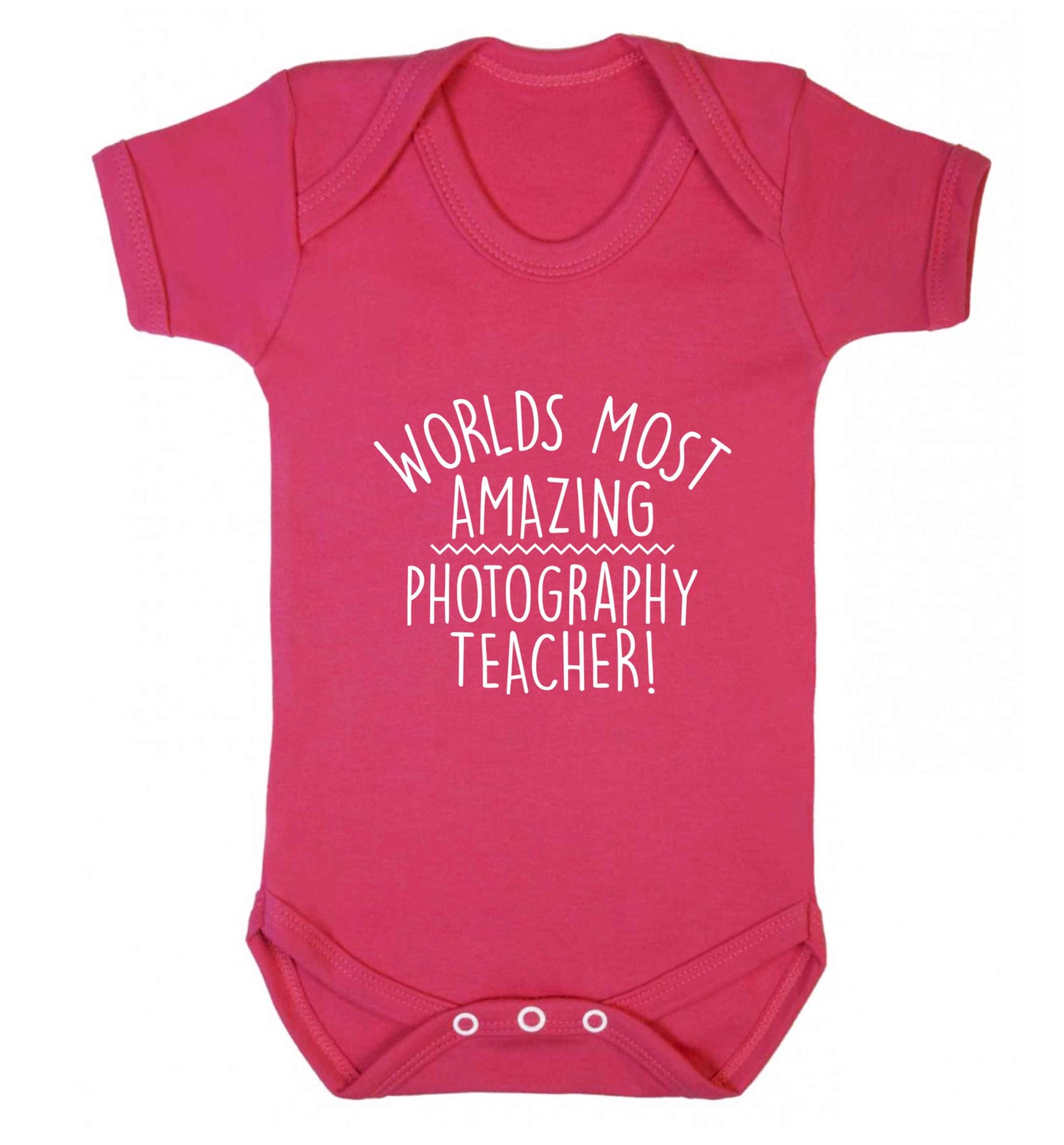 Worlds most amazing photography teacher baby vest dark pink 18-24 months