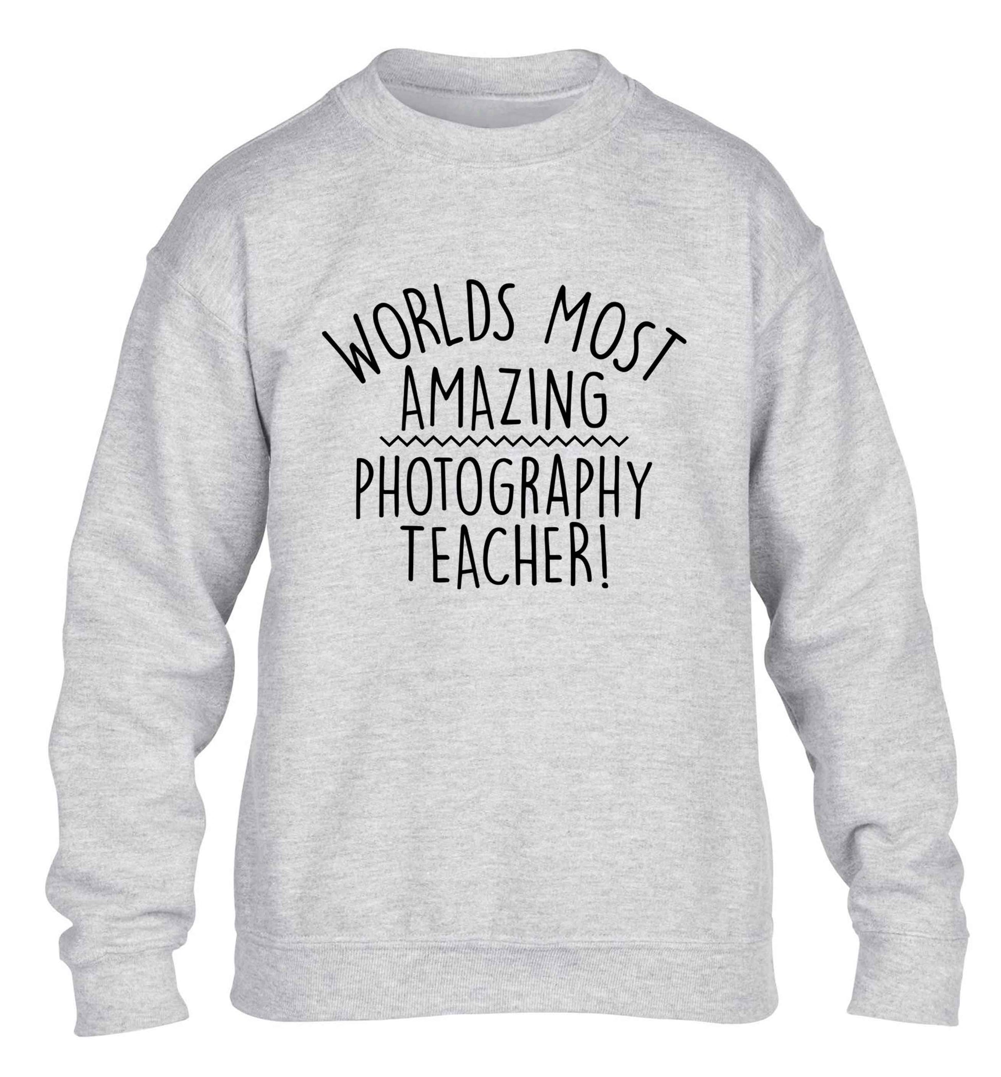 Worlds most amazing photography teacher children's grey sweater 12-13 Years