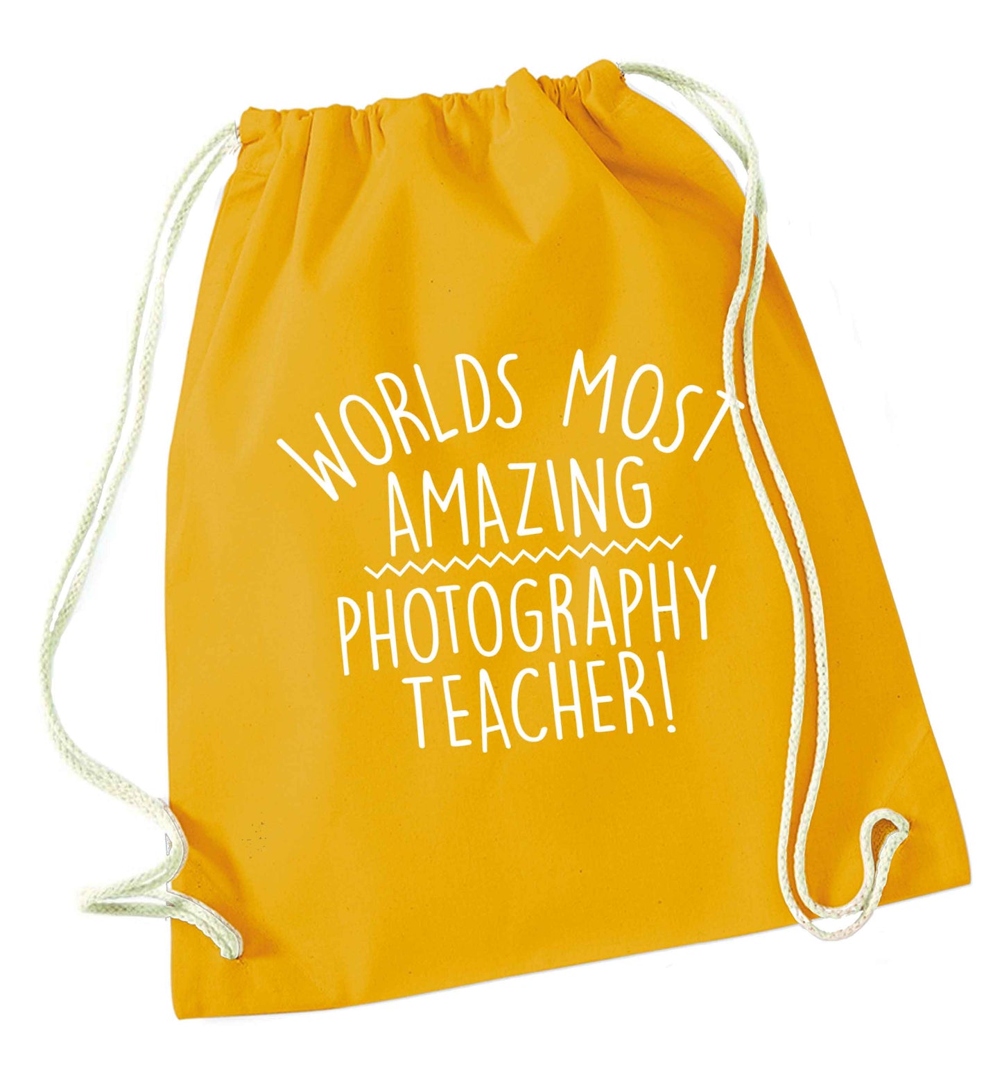 Worlds most amazing photography teacher mustard drawstring bag