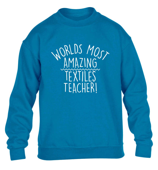 Worlds most amazing textiles teacher children's blue sweater 12-13 Years