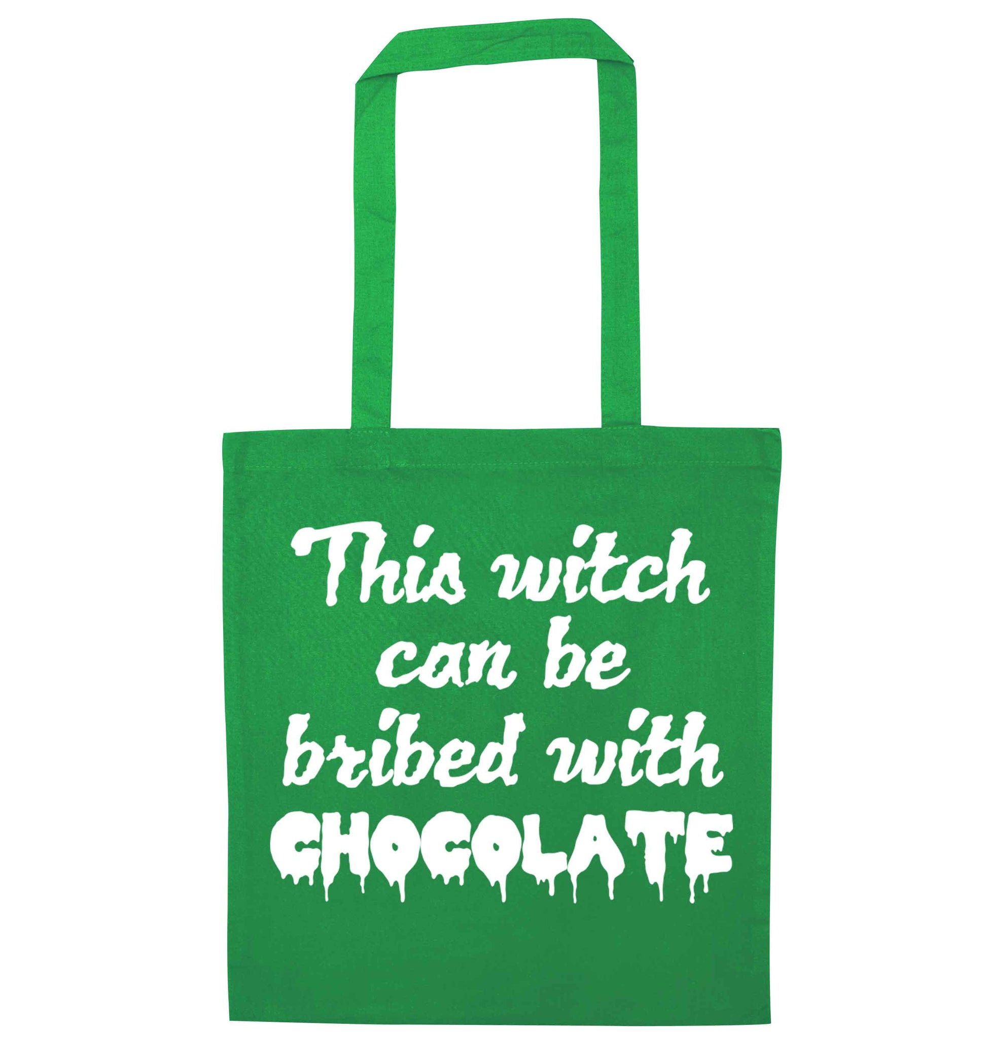 This witch can be bribed with chocolate green tote bag