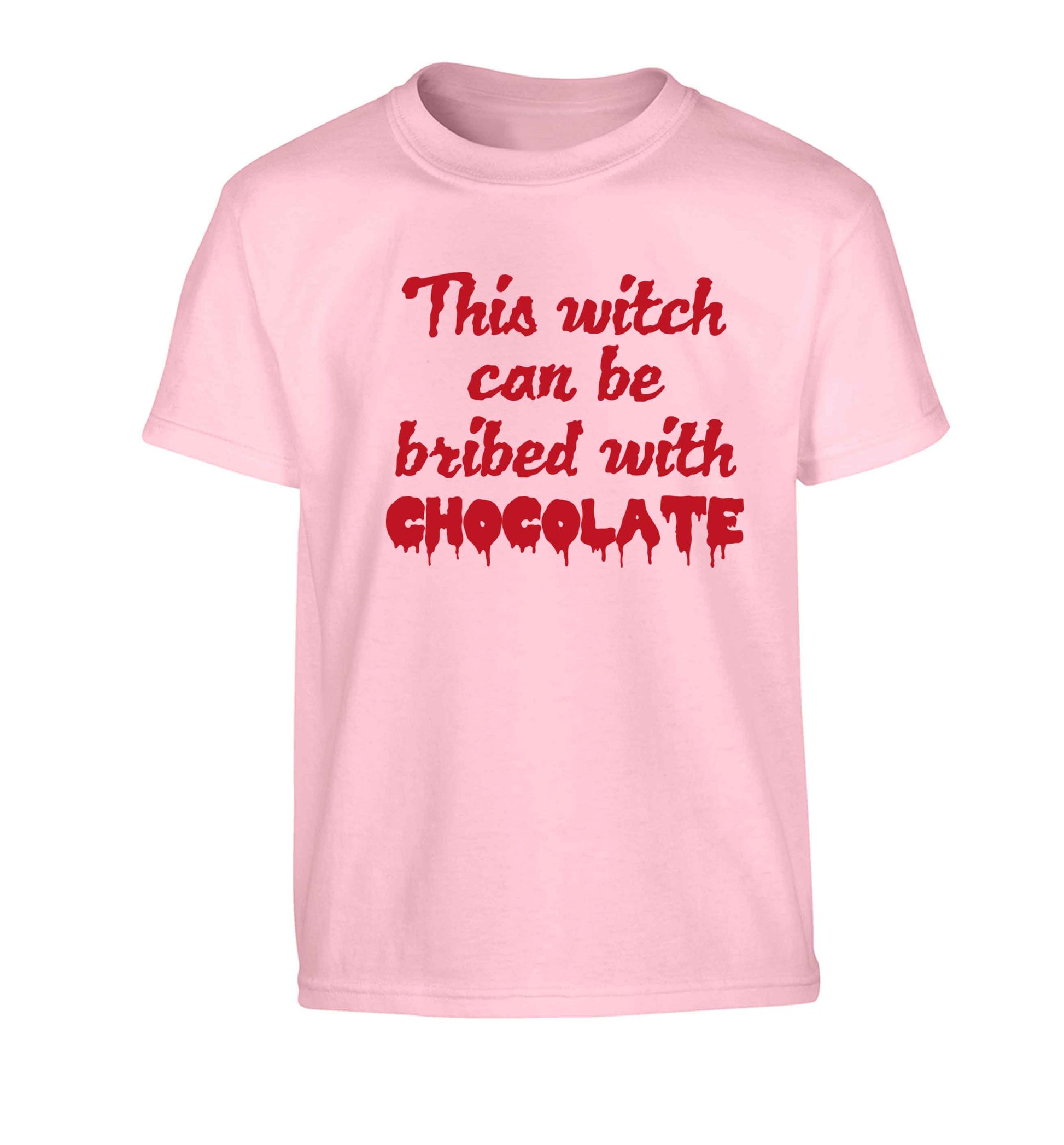 This witch can be bribed with chocolate Children's light pink Tshirt 12-13 Years