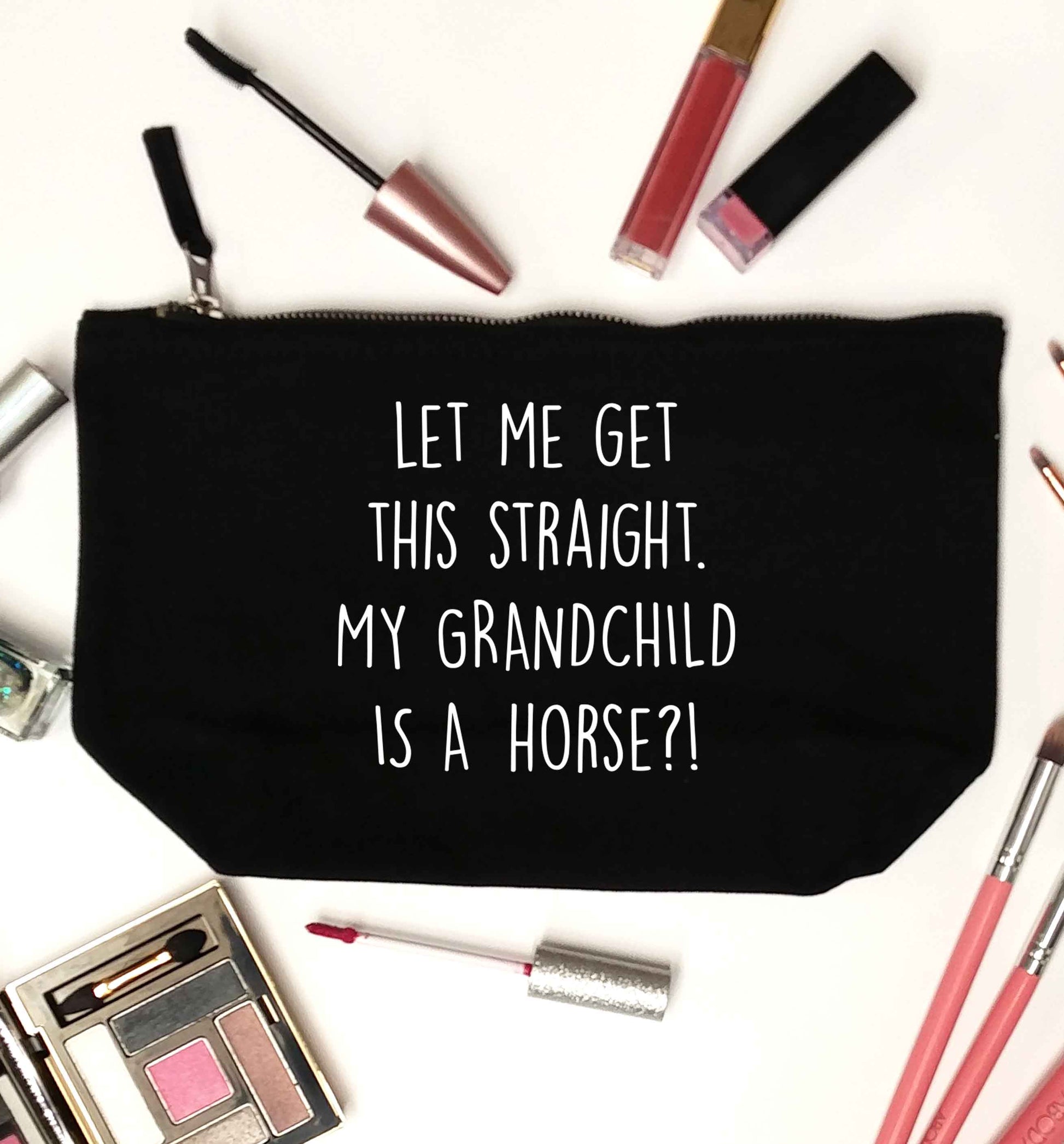 Let me get this straight, my grandchild is a horse?! black makeup bag