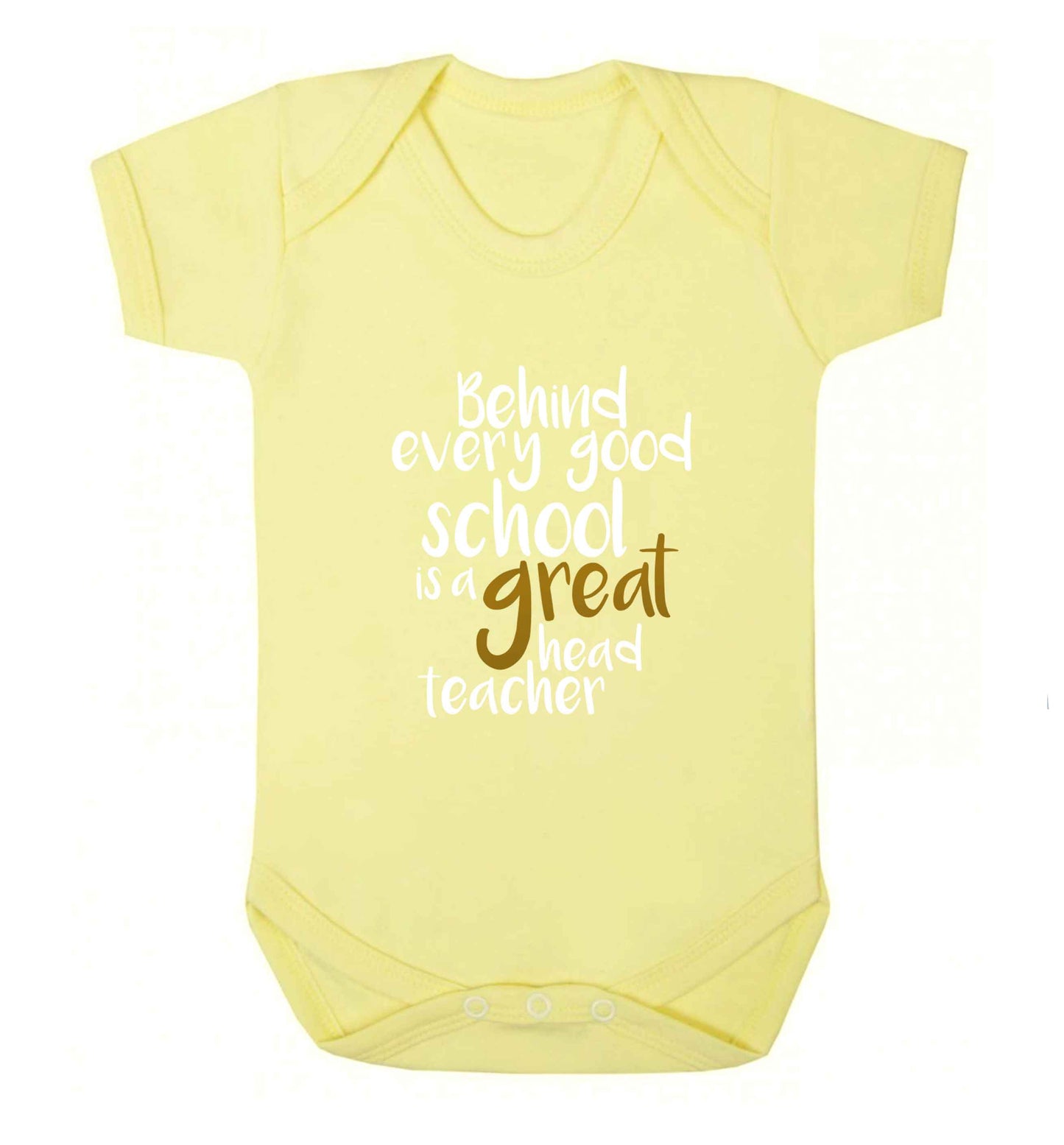 Behind every good school is a great head teacher baby vest pale yellow 18-24 months