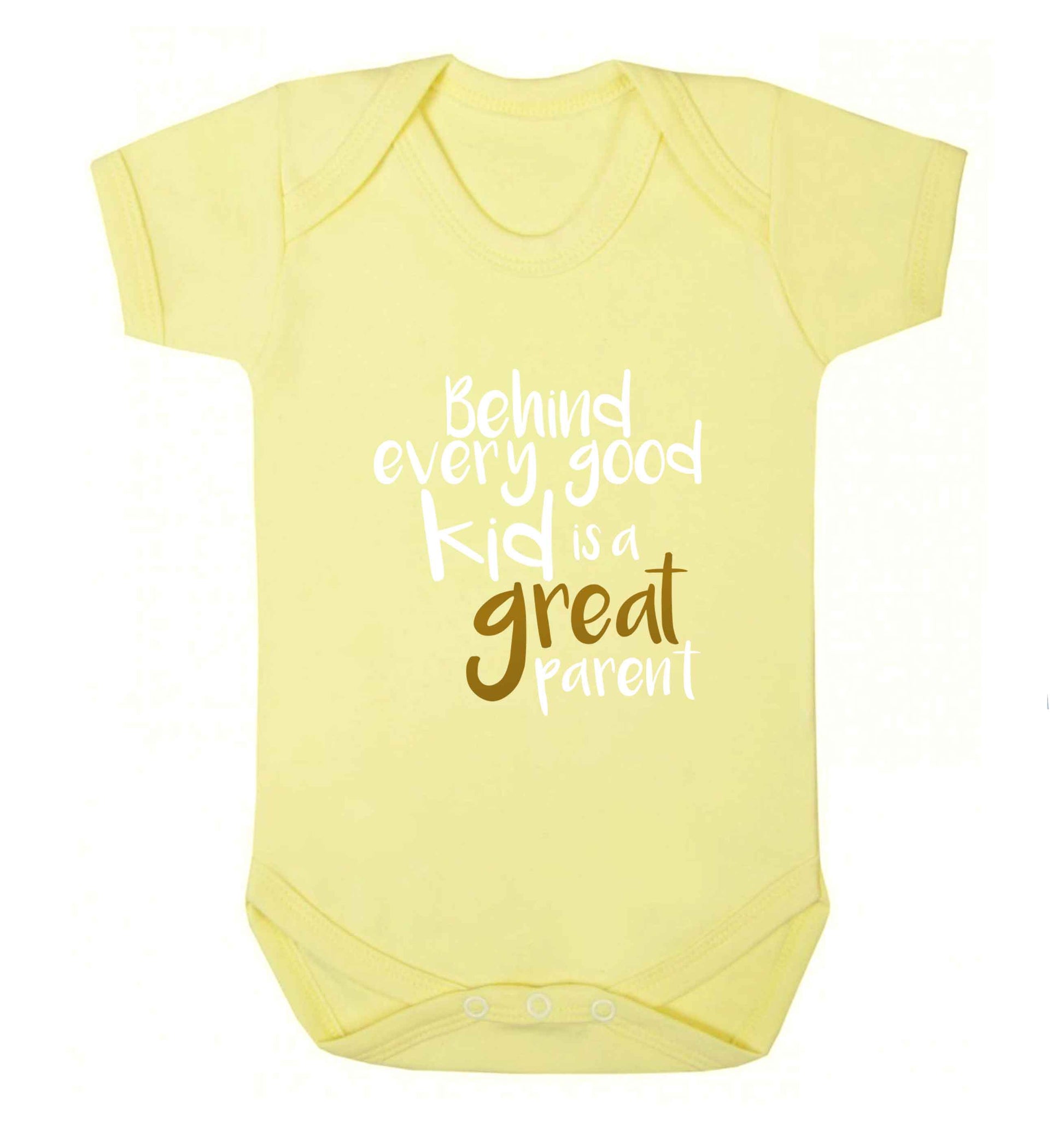 Behind every good kid is a great parent baby vest pale yellow 18-24 months