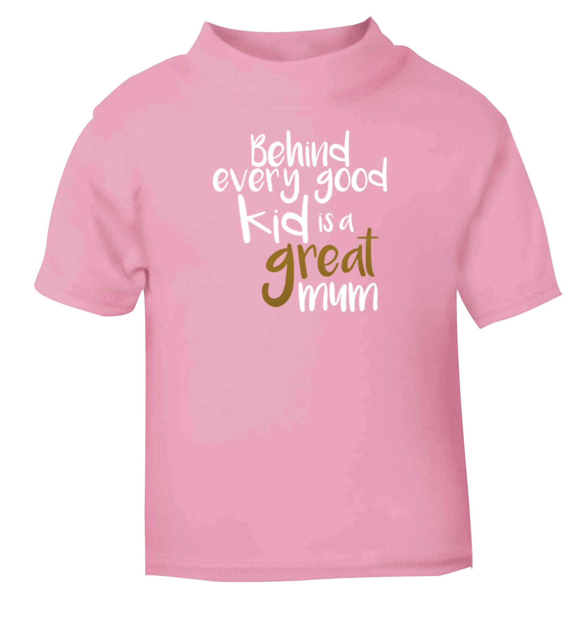 Behind every good kid is a great mum Children's light pink Tshirt 12-13 Years