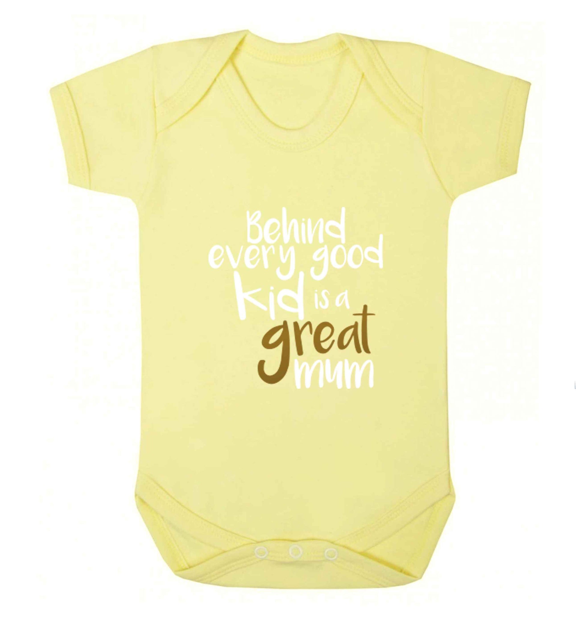 Behind every good kid is a great mum baby vest pale yellow 18-24 months