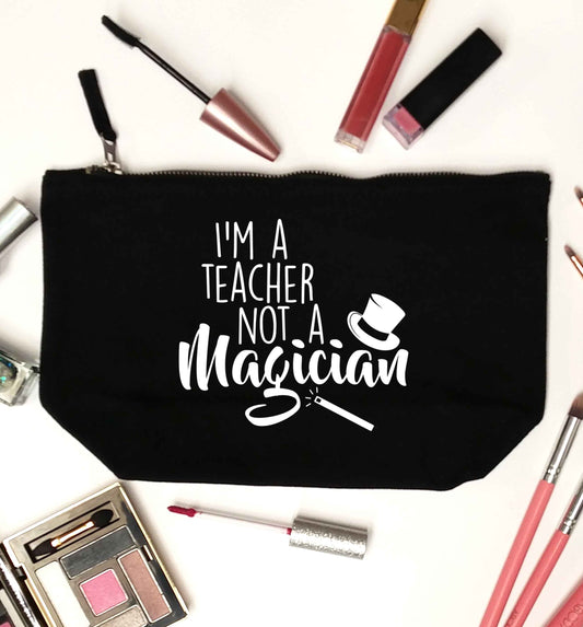 I'm a teacher not a magician black makeup bag