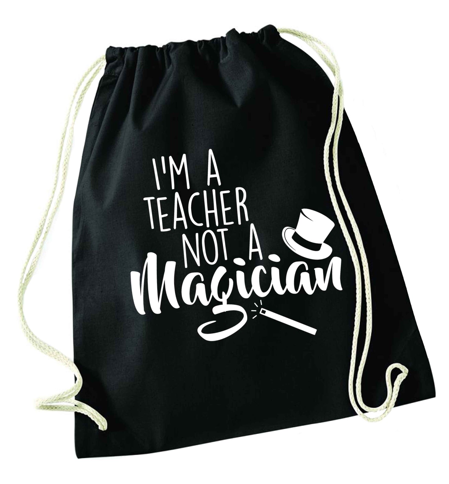 I'm a teacher not a magician black drawstring bag