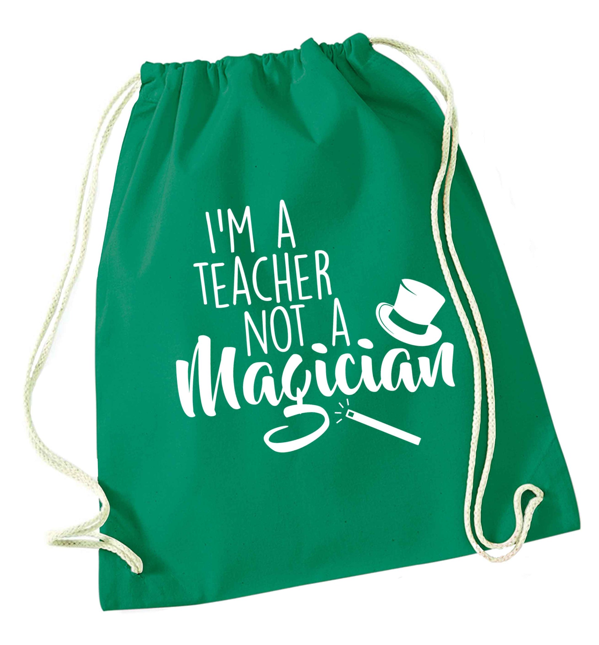 I'm a teacher not a magician green drawstring bag