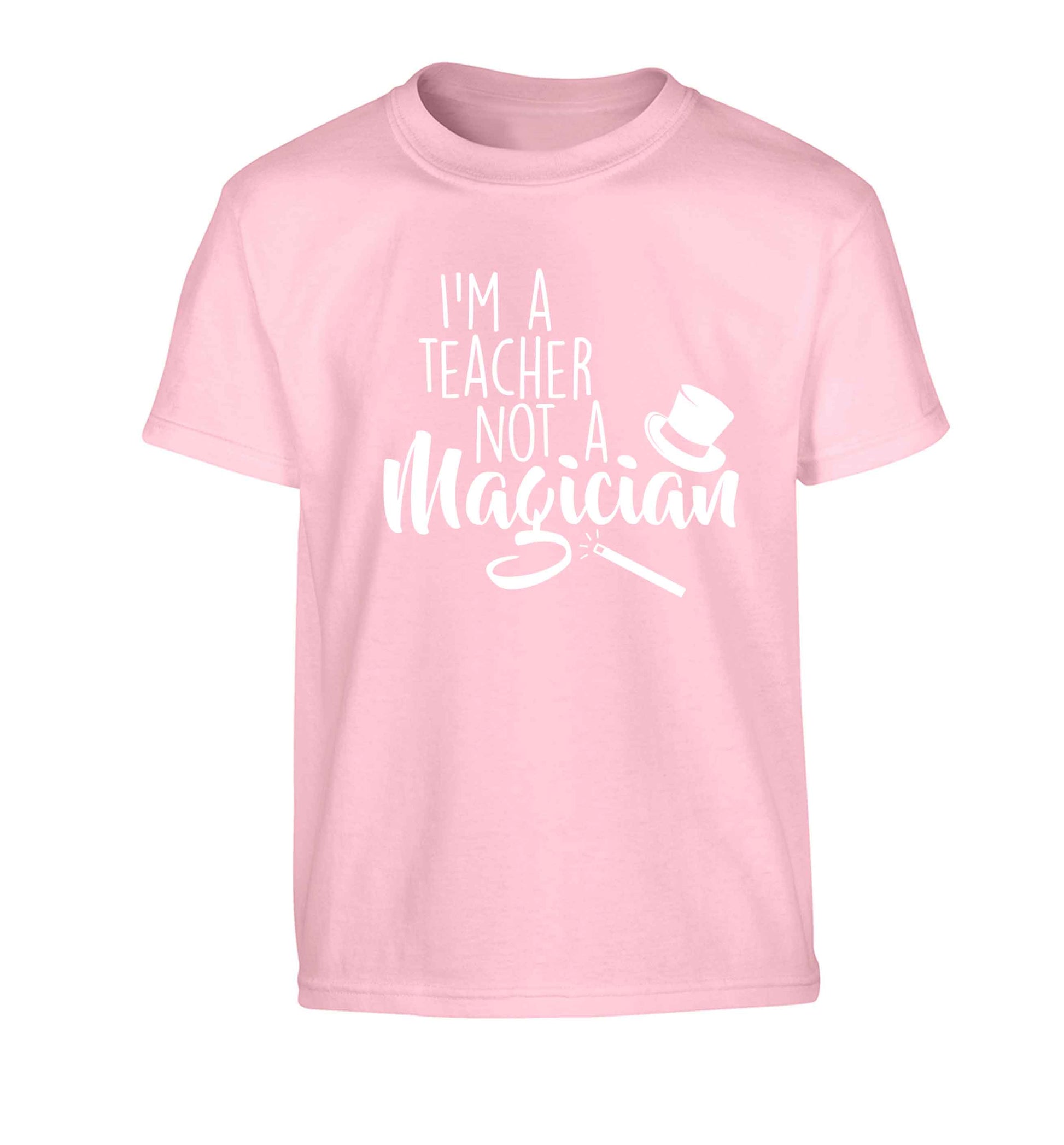 I'm a teacher not a magician Children's light pink Tshirt 12-13 Years