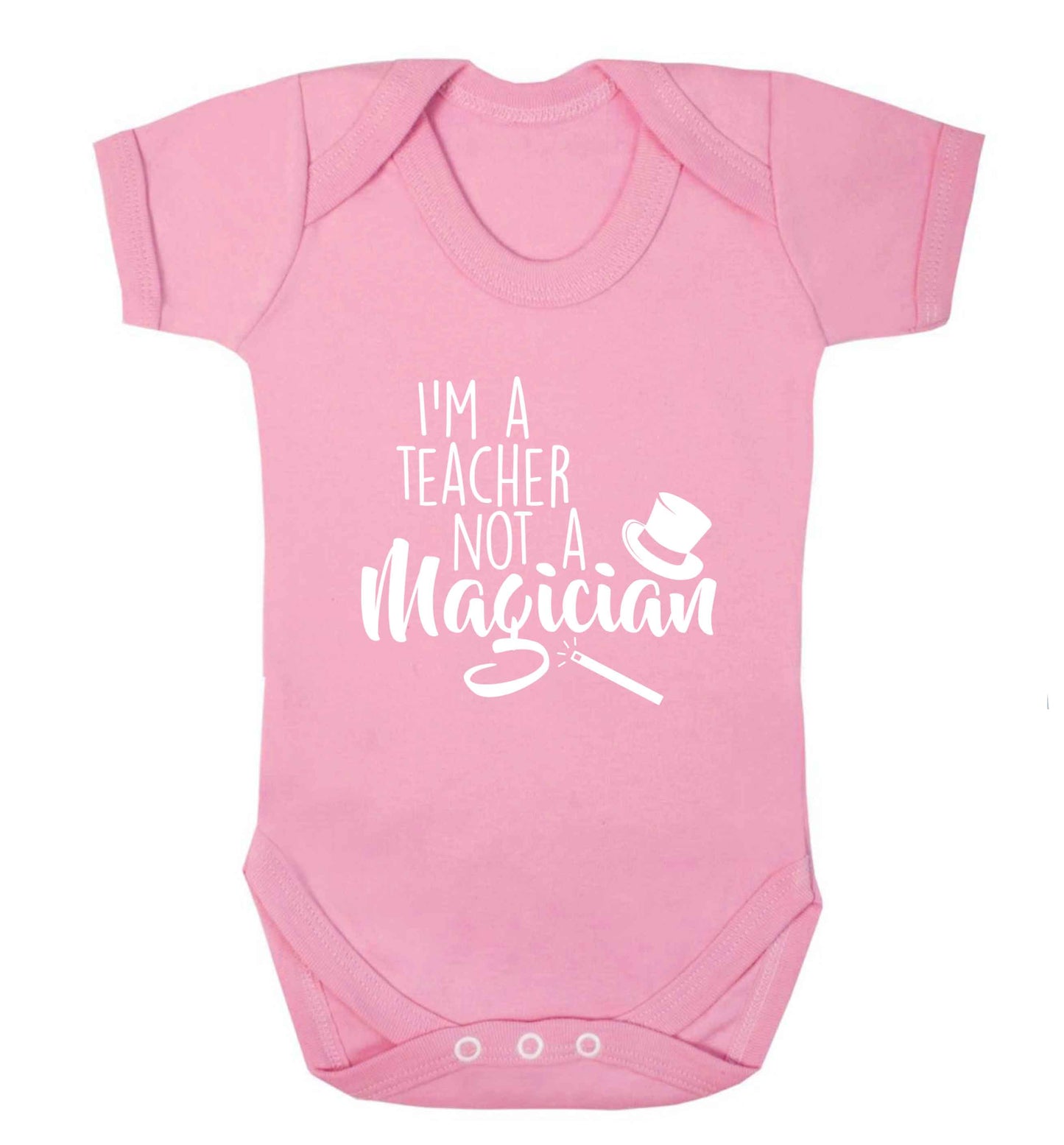 I'm a teacher not a magician baby vest pale pink 18-24 months
