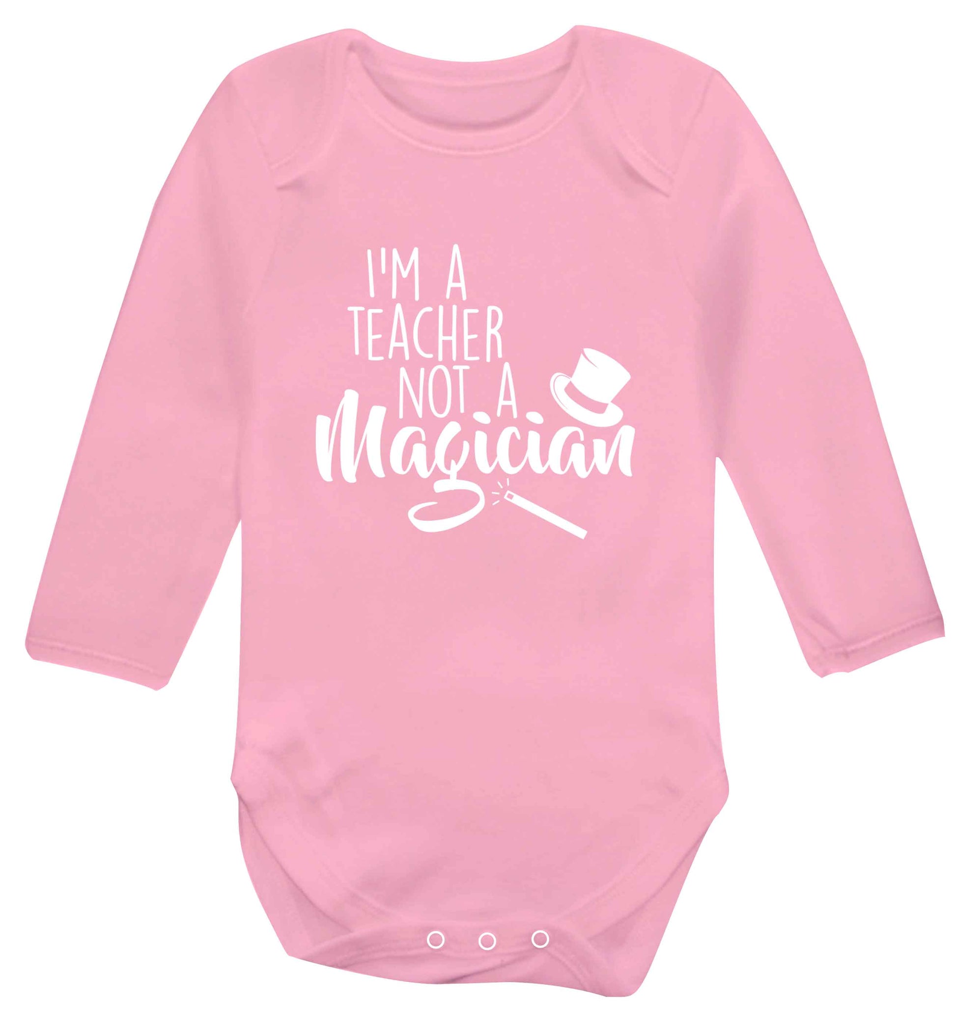 I'm a teacher not a magician baby vest long sleeved pale pink 6-12 months