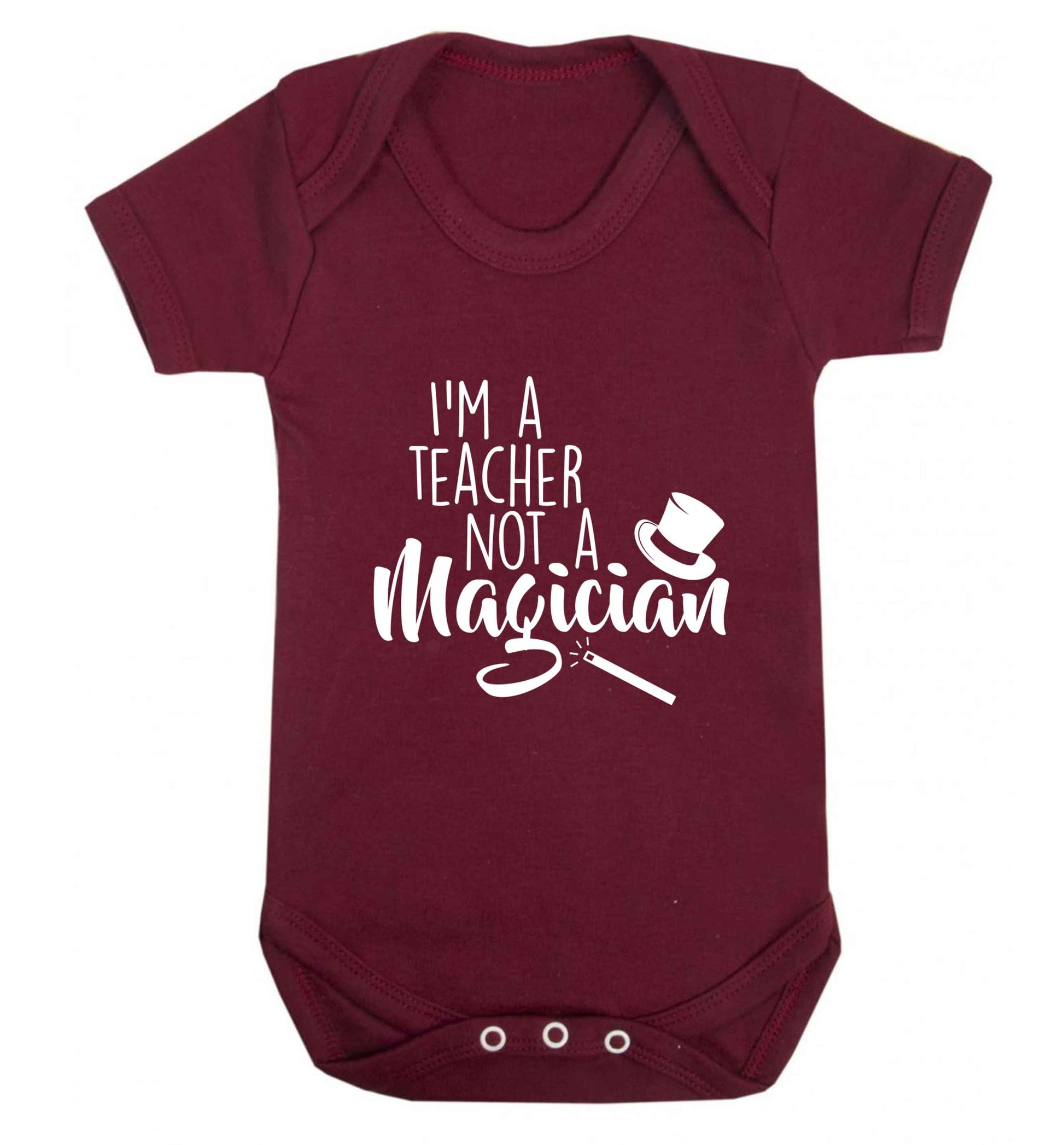 I'm a teacher not a magician baby vest maroon 18-24 months
