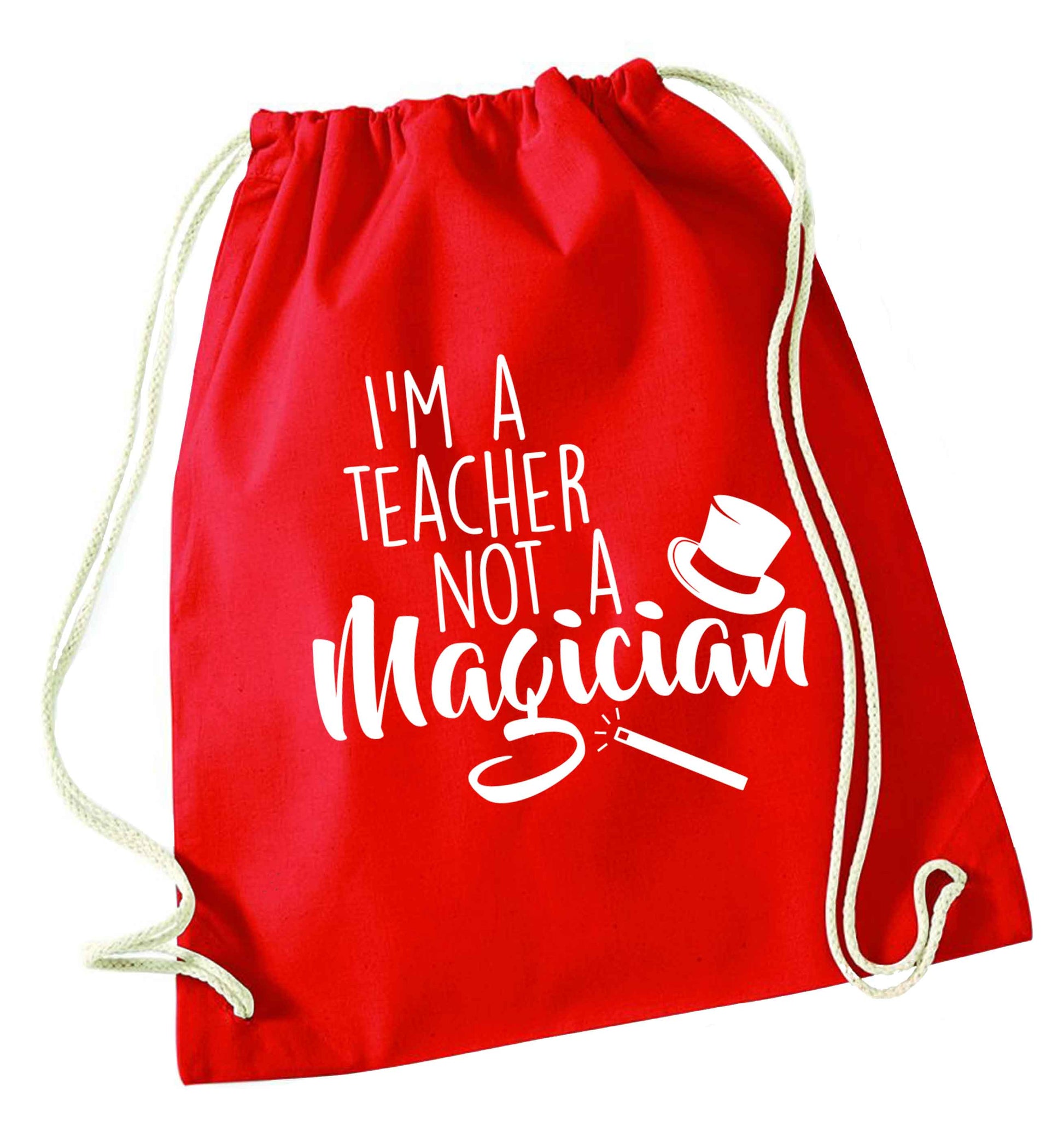 I'm a teacher not a magician red drawstring bag 