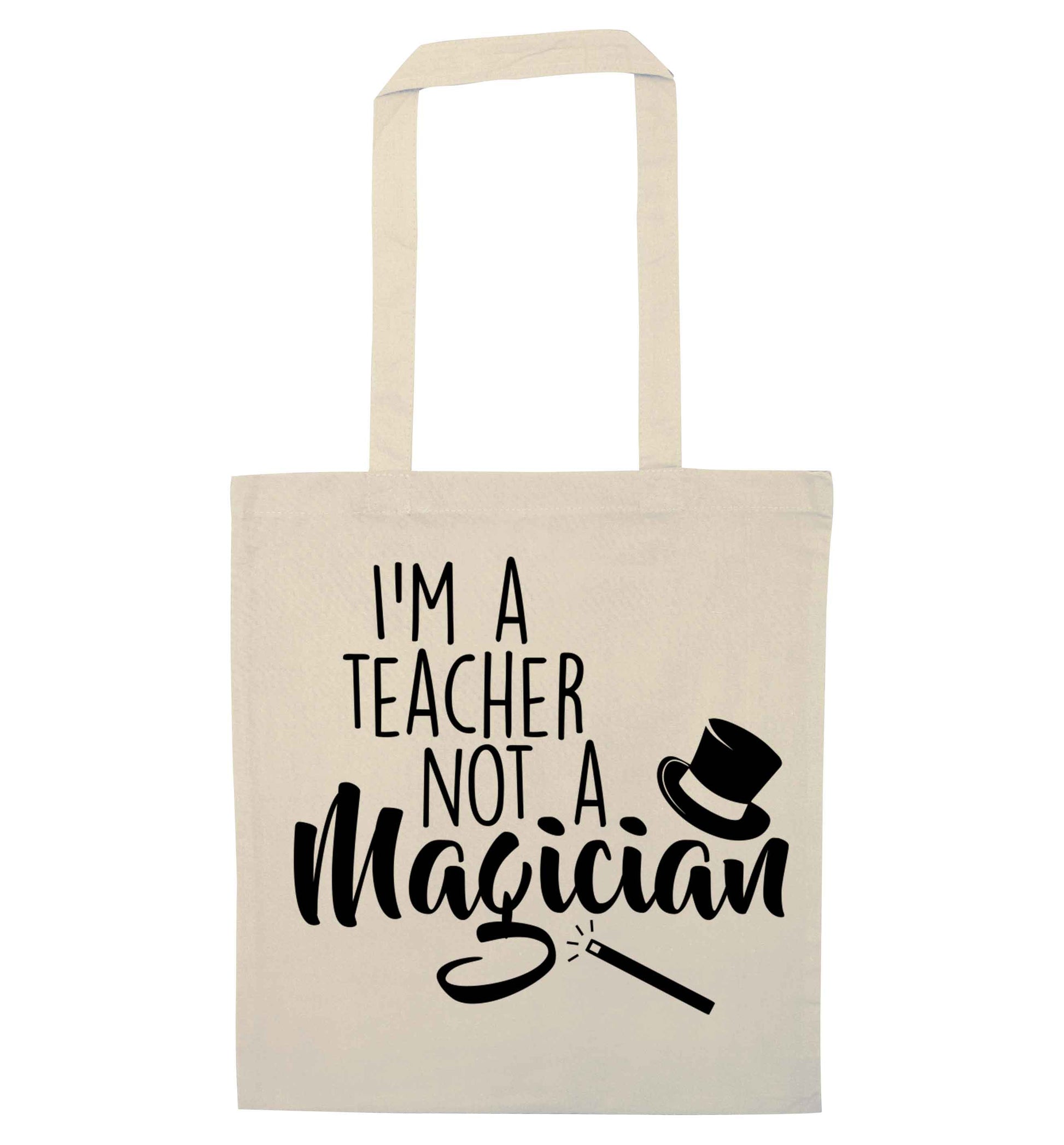 I'm a teacher not a magician natural tote bag