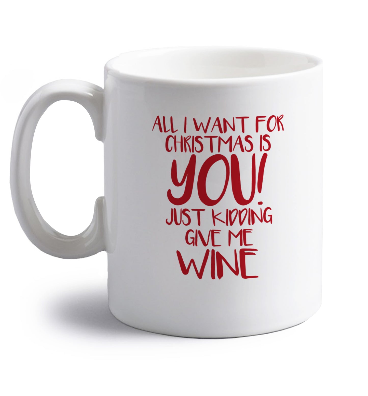 All I want for christmas is you just kidding give me the wine right handed white ceramic mug 