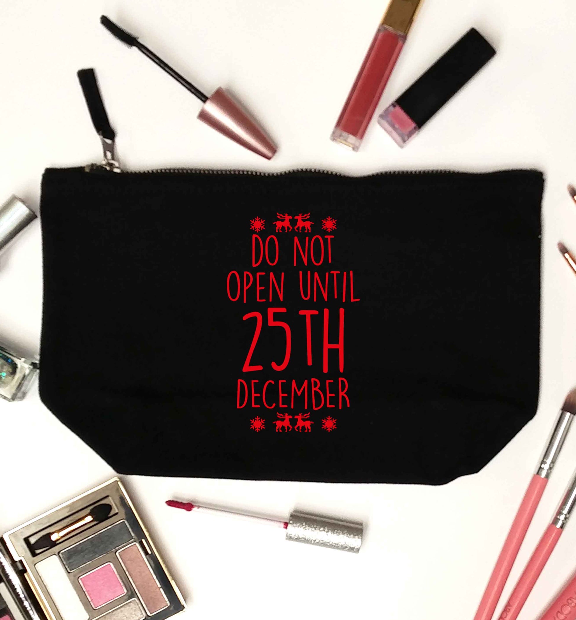 Christmas Eve Checklist black makeup bag