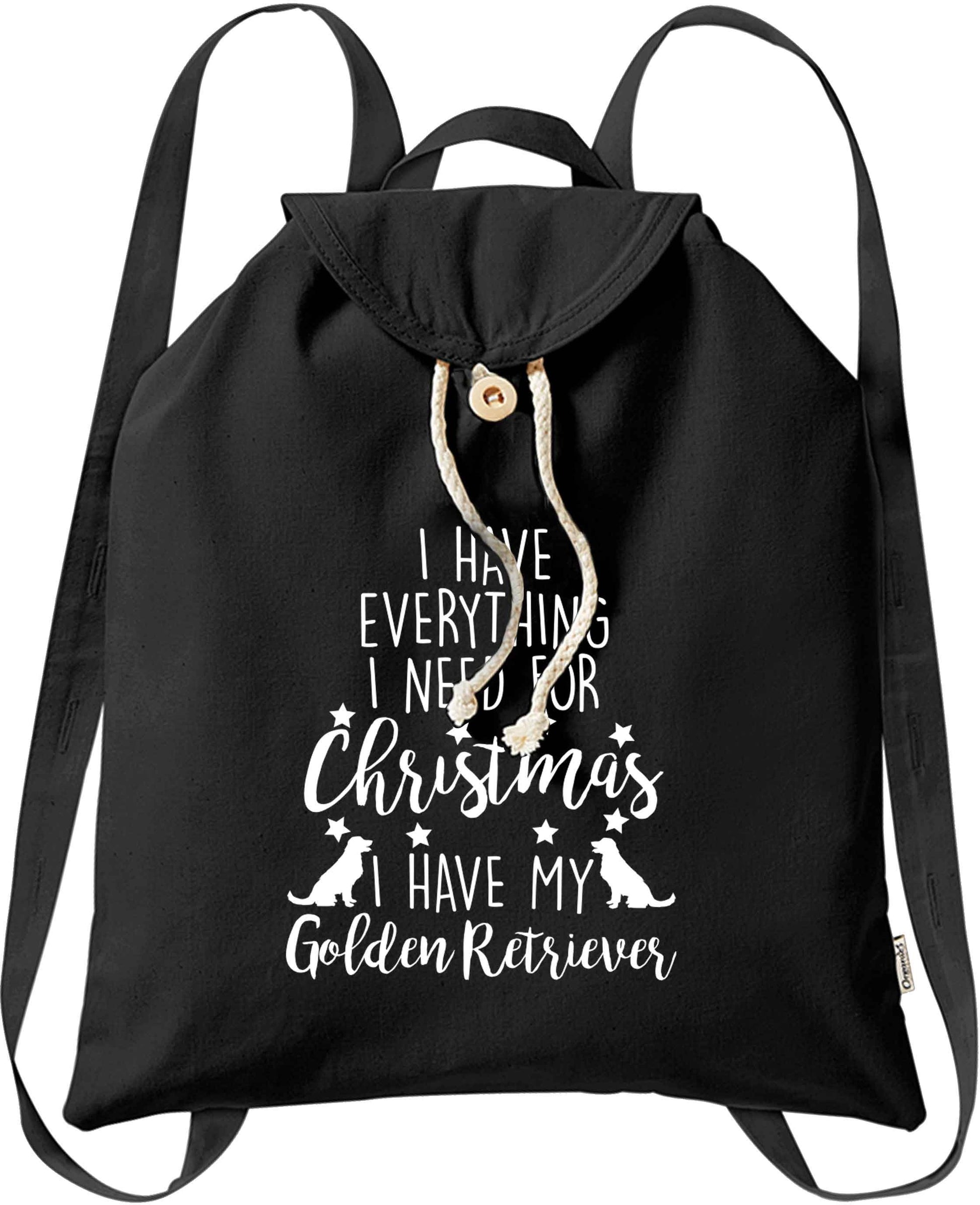 I have everything I need for Christmas I have my golden retriever organic cotton backpack tote with wooden buttons in black