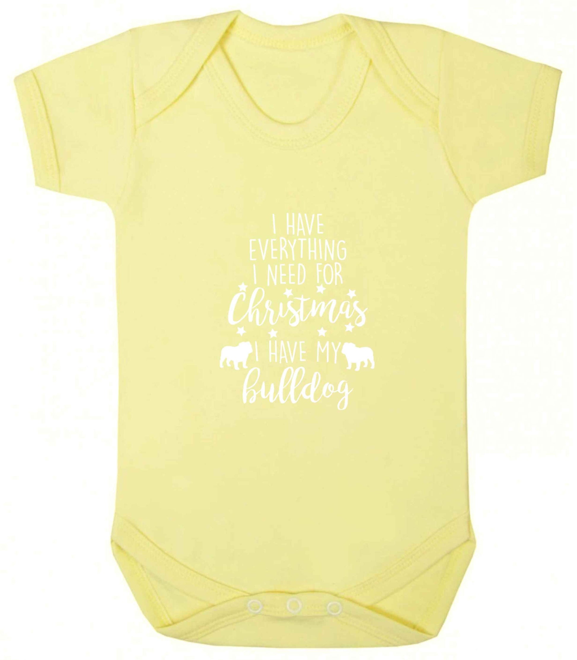 I have everything I need for Christmas I have my bulldog baby vest pale yellow 18-24 months