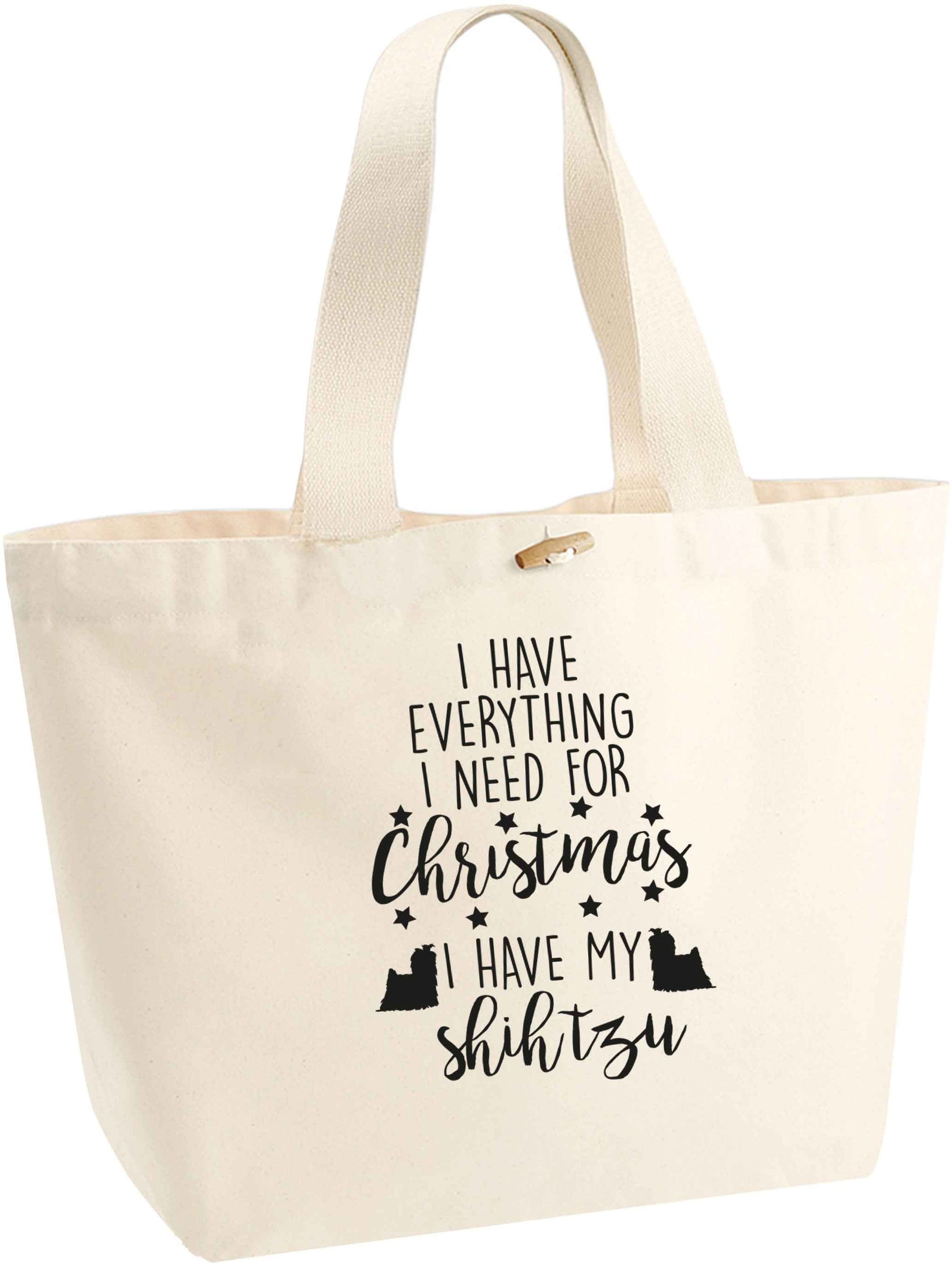 I have everything I need for Christmas I have my shih tzu organic cotton premium tote bag with wooden toggle in natural