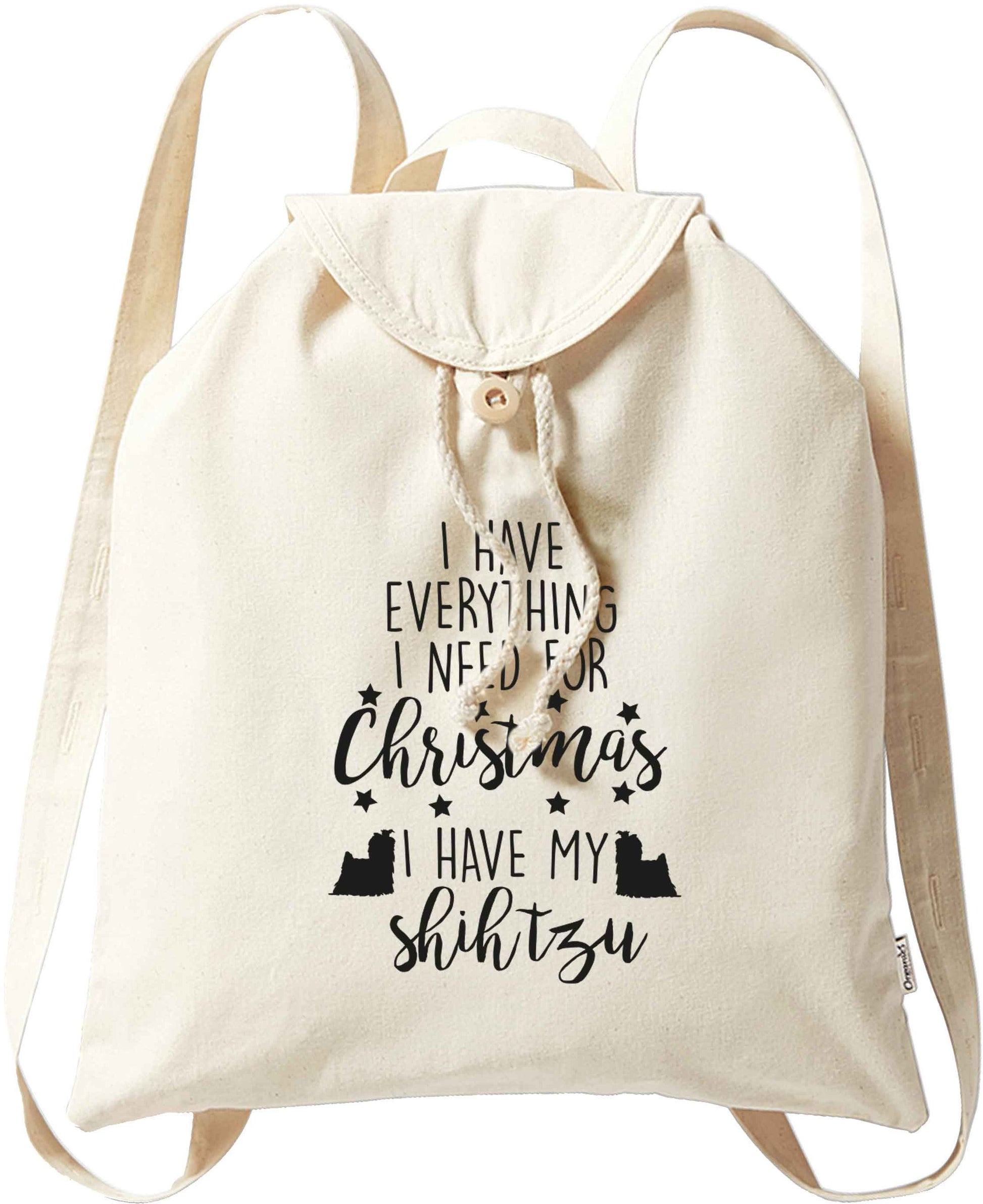 I have everything I need for Christmas I have my shih tzu organic cotton backpack tote with wooden buttons in natural