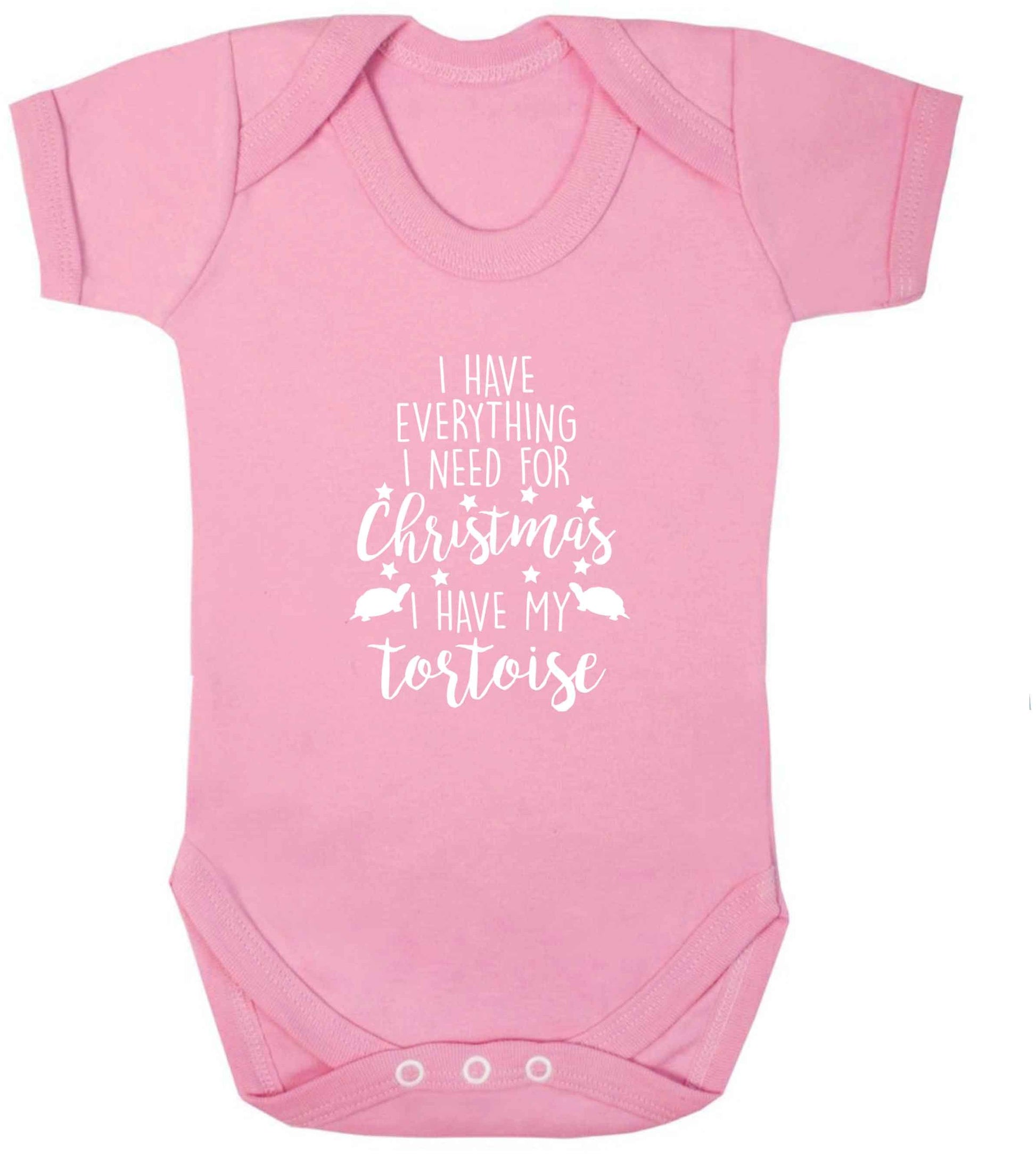 I have everything I need for Christmas I have my tortoise baby vest pale pink 18-24 months