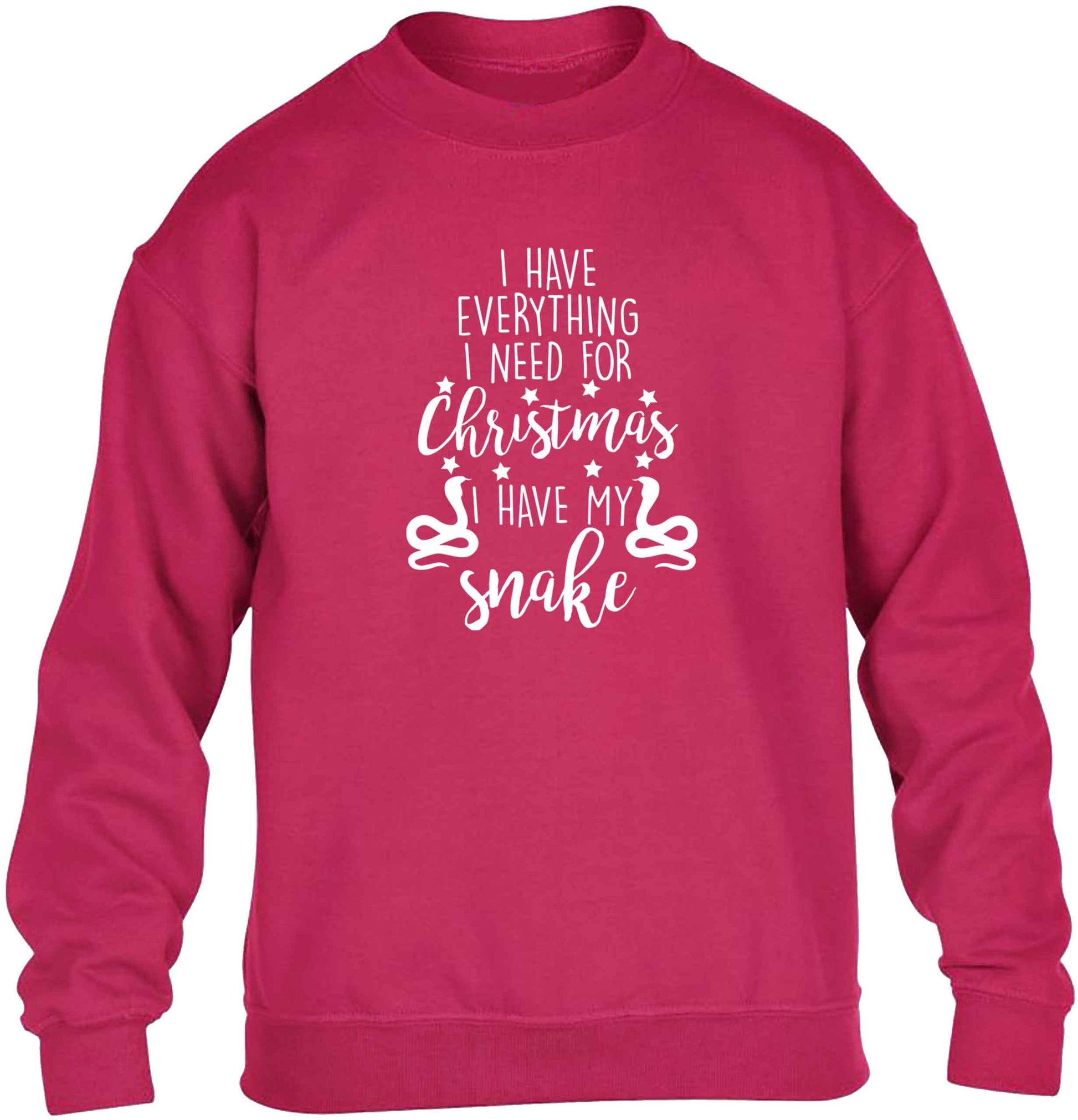 I have everything I need for Christmas I have my snake children's pink sweater 12-13 Years