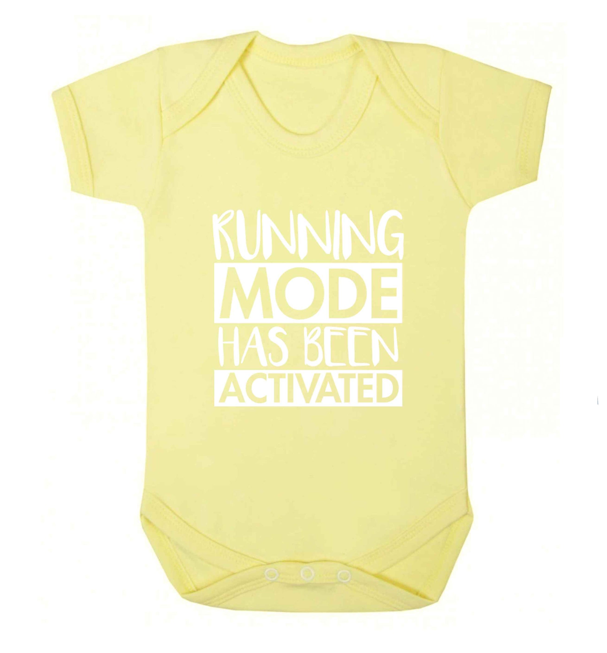 Running mode has been activated baby vest pale yellow 18-24 months
