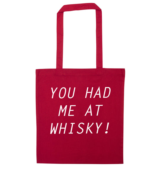 You had me at whisky red tote bag