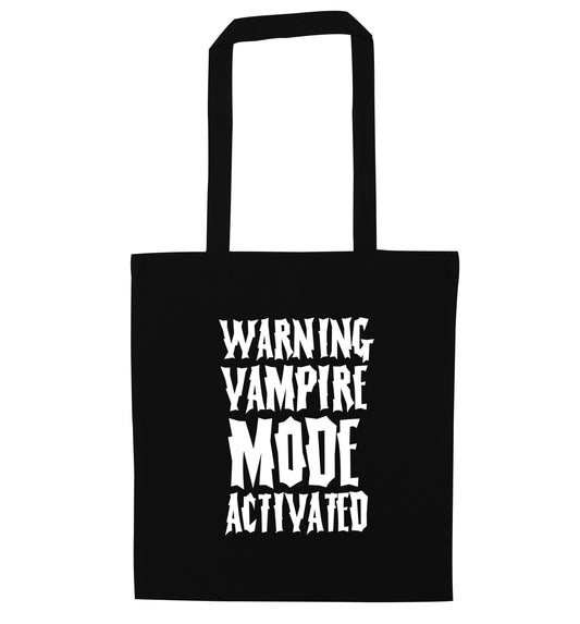 Vampire mode activated black tote bag