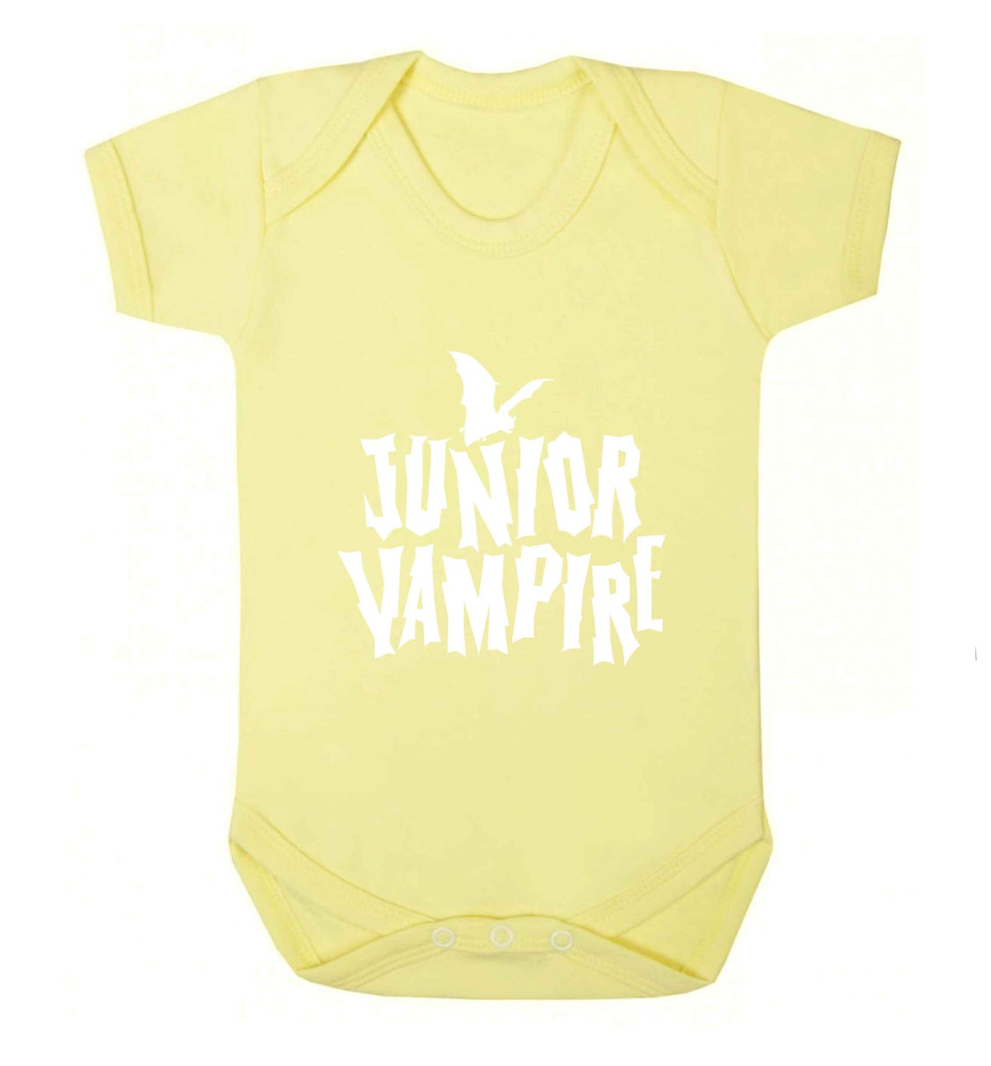 Junior vampire baby vest pale yellow 18-24 months