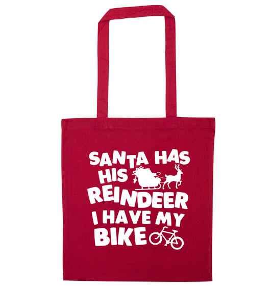 Santa has his reindeer I have my bike red tote bag