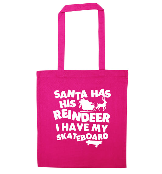 Santa has his reindeer I have my skateboard pink tote bag