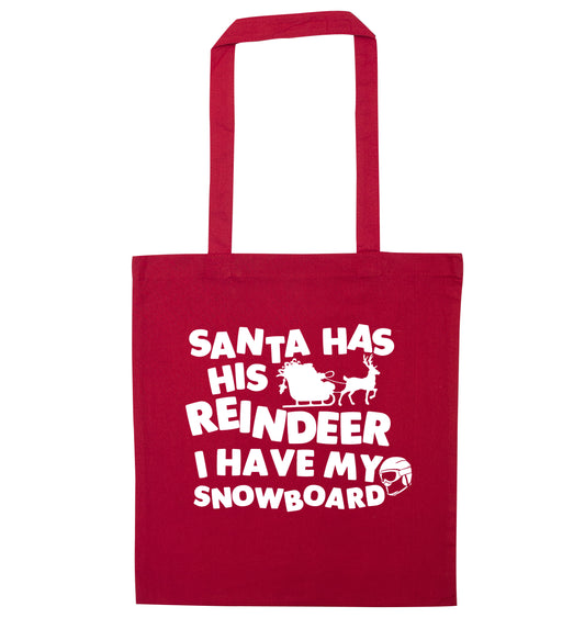 Santa has his reindeer I have my snowboard red tote bag