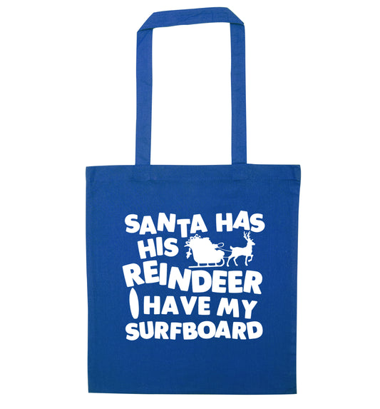 Santa has his reindeer I have my surfboard blue tote bag
