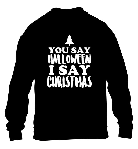 You say halloween I say christmas! children's black sweater 12-14 Years