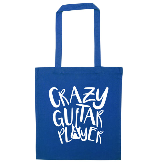 Crazy guitar player blue tote bag