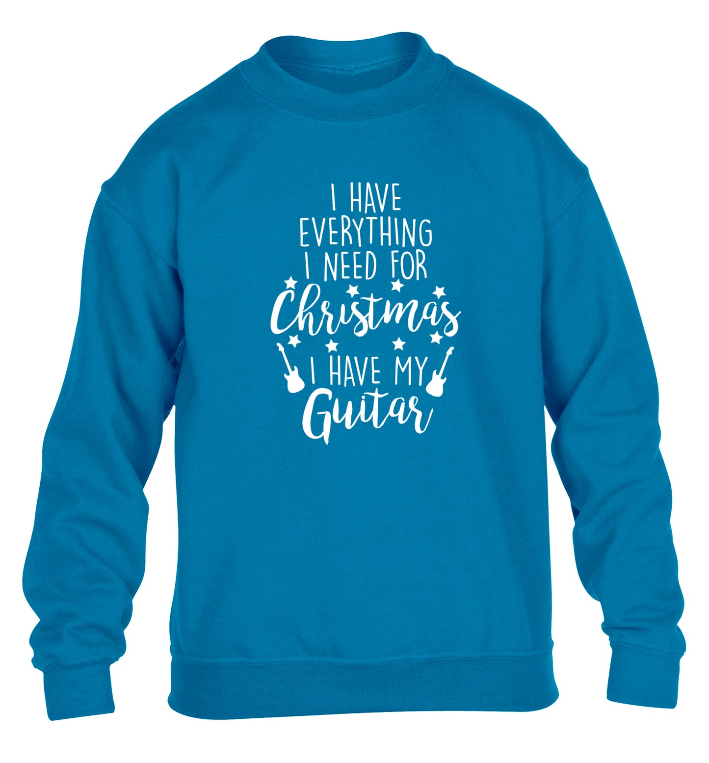 I have everything I need for Christmas I have my guitar children's blue sweater 12-14 Years