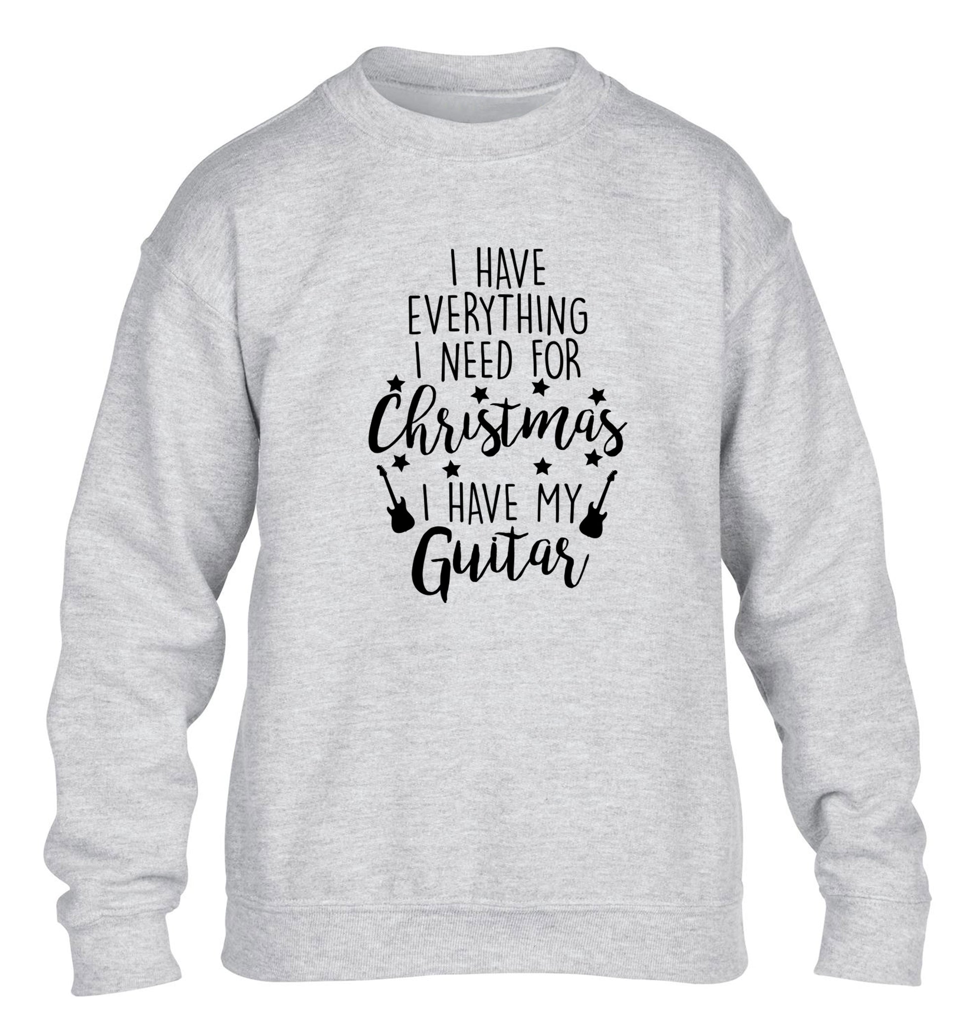 I have everything I need for Christmas I have my guitar children's grey sweater 12-14 Years