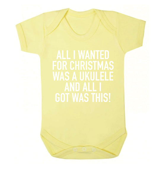 All I wanted for Christmas was a ukulele and all I got was this! Baby Vest pale yellow 18-24 months