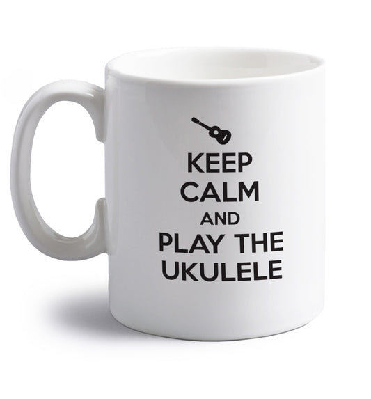 Keep calm and play the ukulele right handed white ceramic mug 