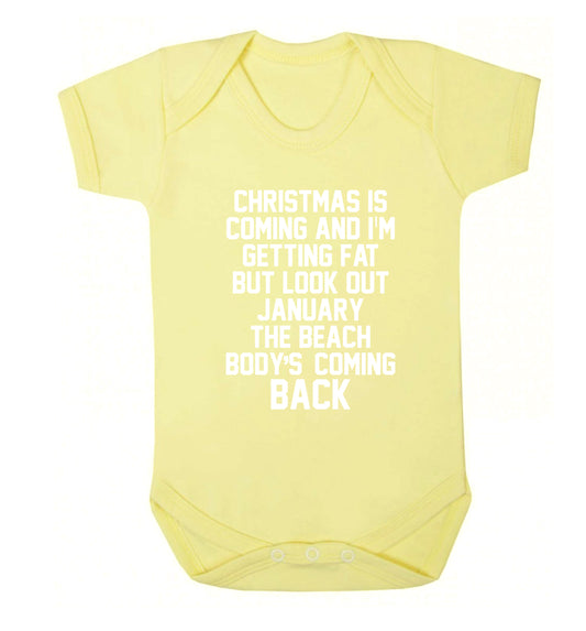 Christmas is coming and I'm getting fat but look out January the beach body's coming back! Baby Vest pale yellow 18-24 months