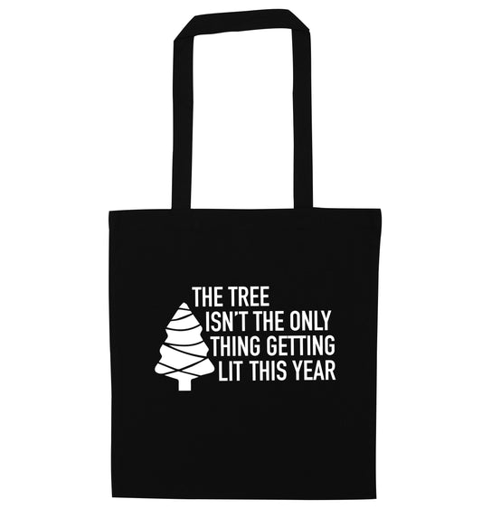 The tree isn't the only thing getting lit this year black tote bag