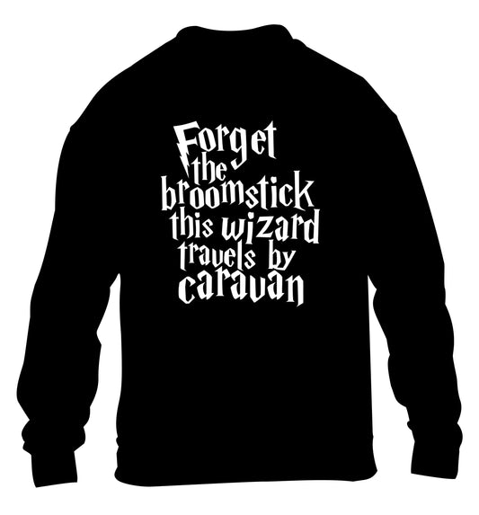 Forget the broomstick this wizard travels by caravan children's black sweater 12-14 Years
