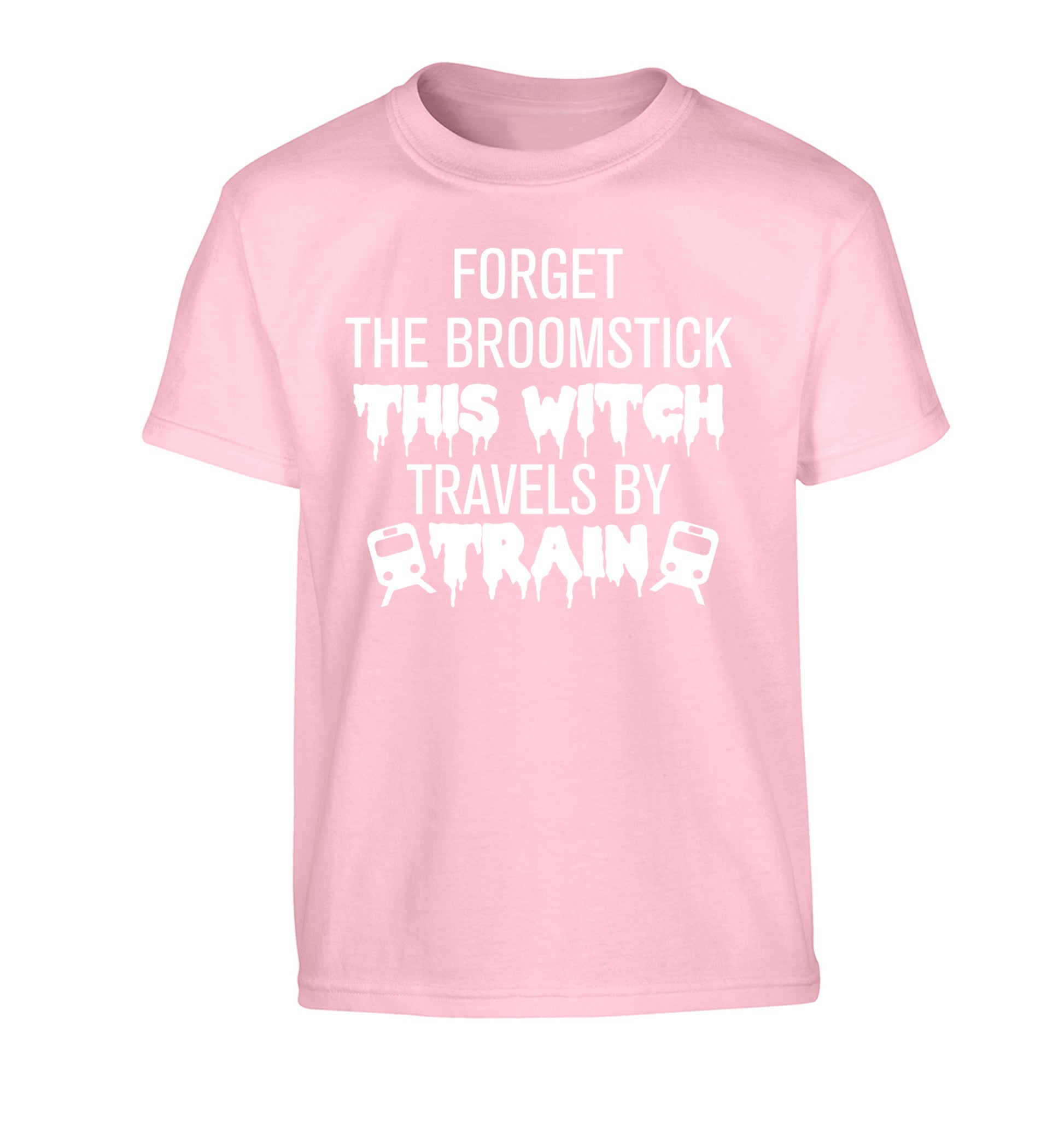 Forget the broomstick this witch travels by train Children's light pink Tshirt 12-14 Years