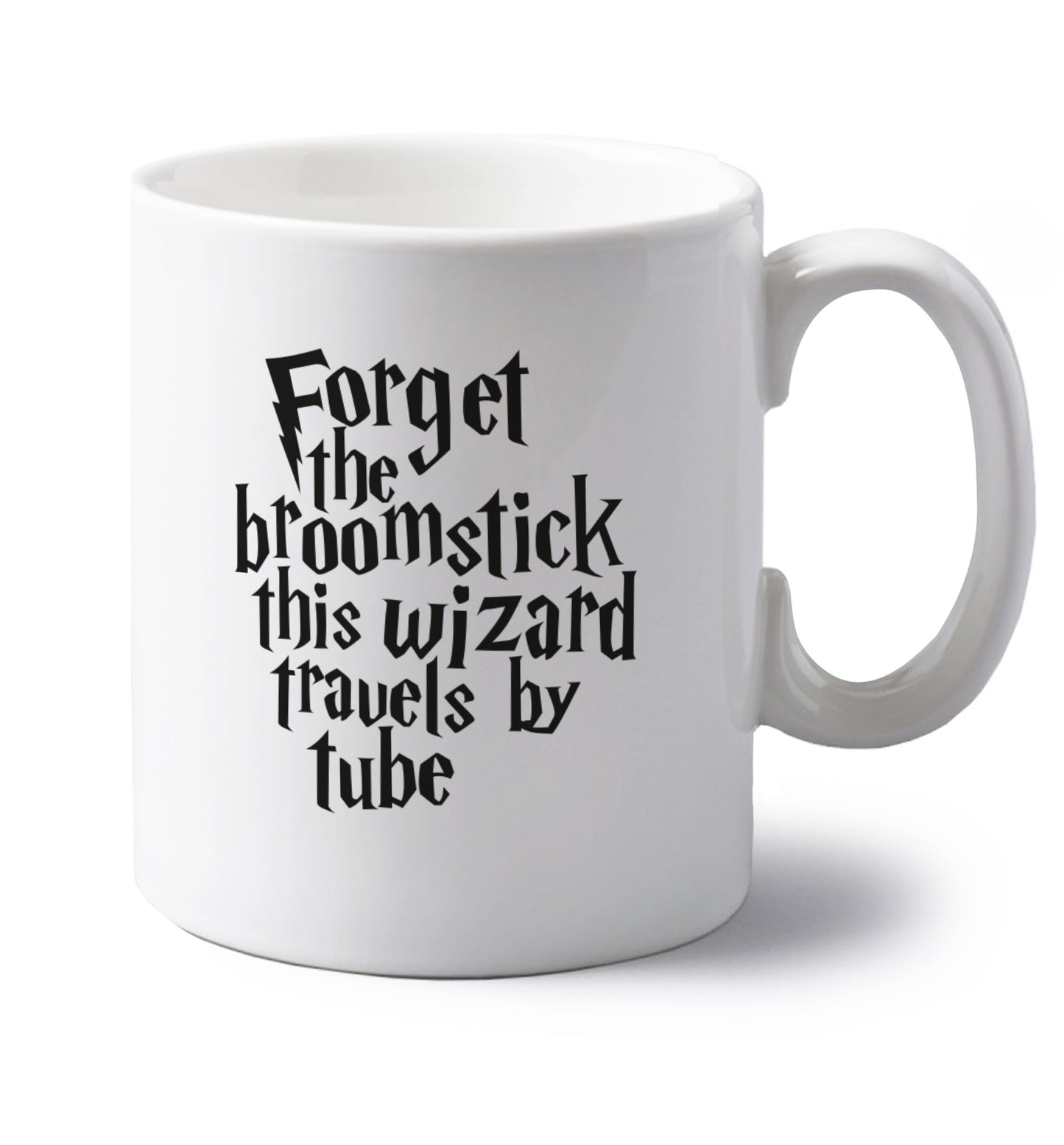 Forget the broomstick this wizard travels by tube left handed white ceramic mug 